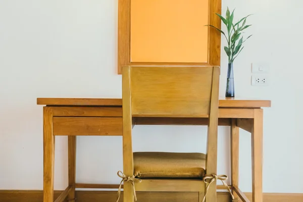 Wooden table and chair in living area — Stock Photo, Image