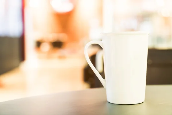 Coffee cup in coffee shop — Stock Photo, Image