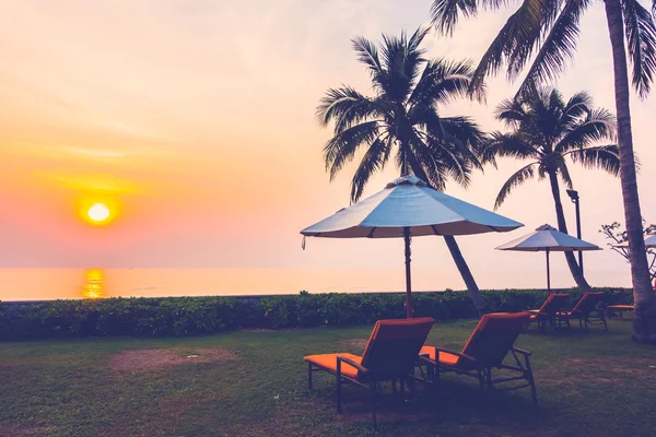 Empty umbrellas and chairs at Twilight Times