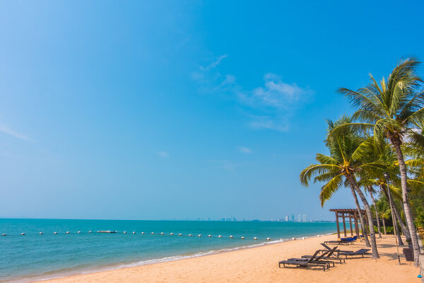 Beautiful beach and sea with palm trees