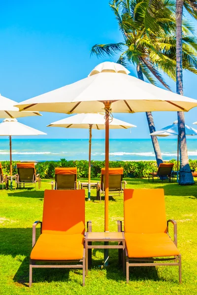 Empty Umbrellas and chairs — Stock Photo, Image