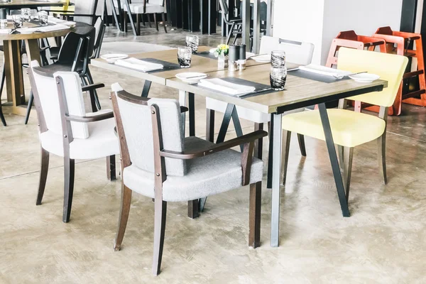 Empty chairs and tables in restaurant — Stock Photo, Image