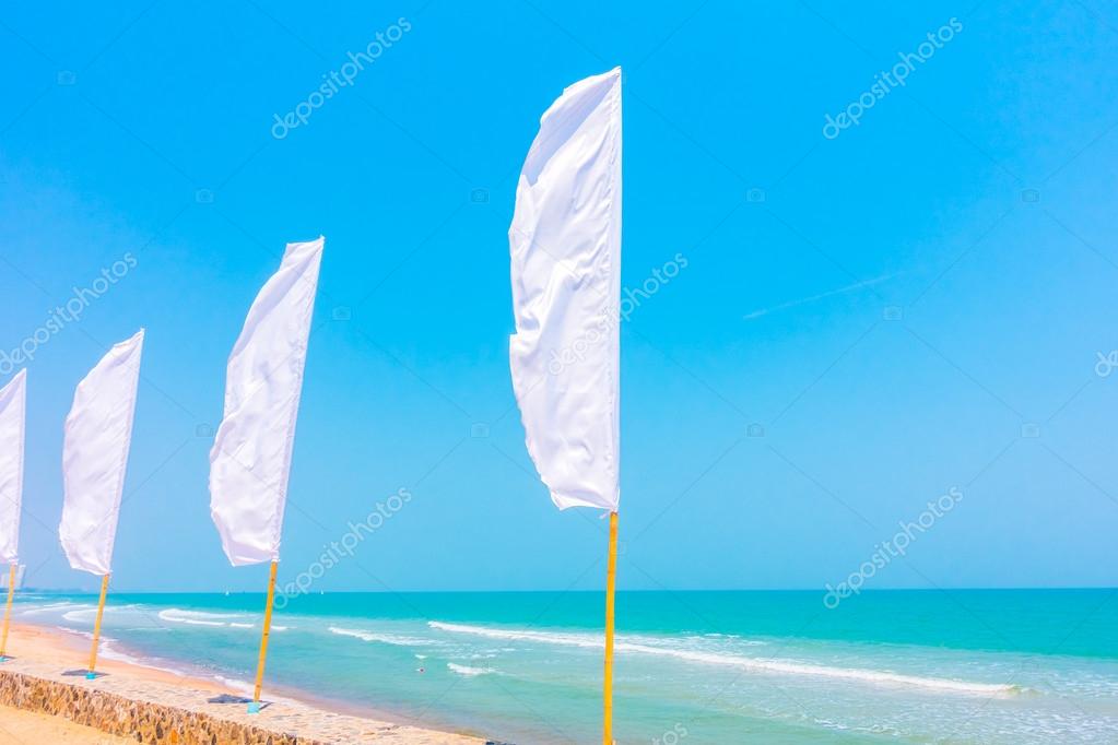 White flags on beach — Stock Photo © mrsiraphol 104423852