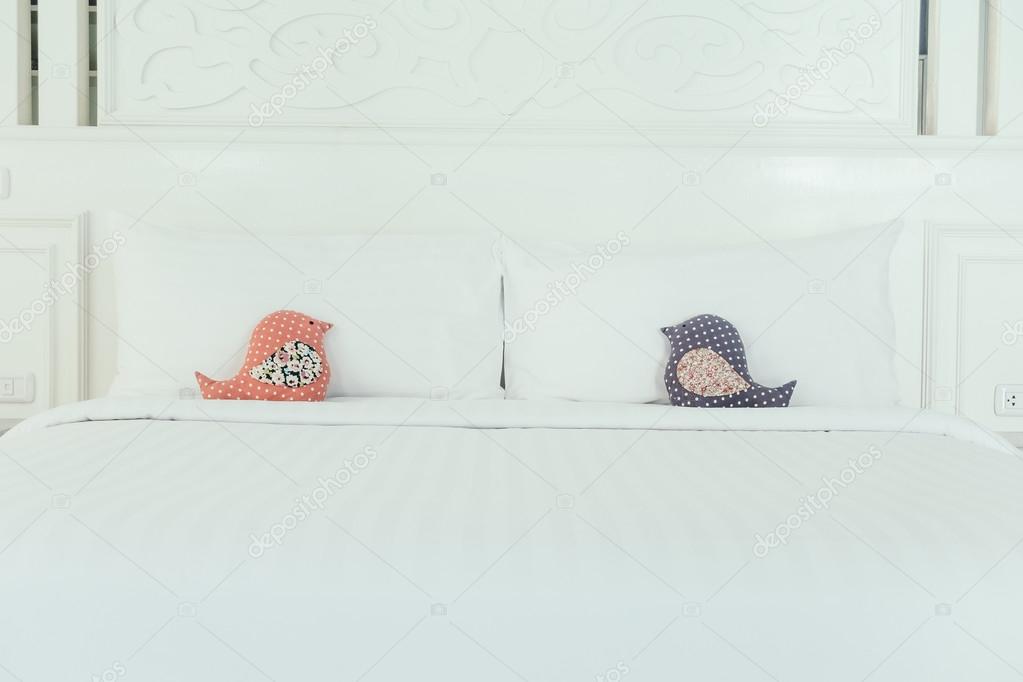 Beautiful luxury pillows on bed Stock Photo by ©mrsiraphol 104828228
