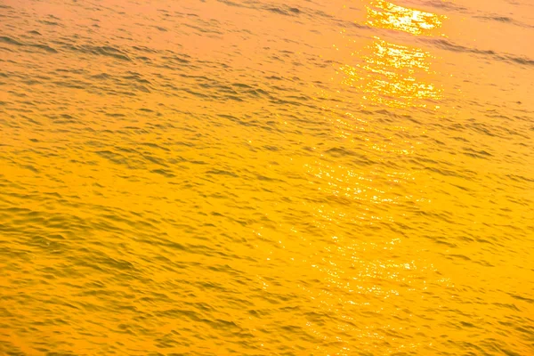 Zonsondergang en zee achtergrond — Stockfoto