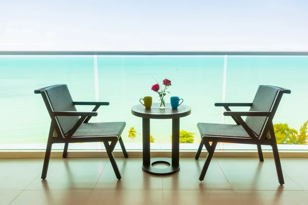 Table and chair with outdoor balcony — Stock Photo, Image