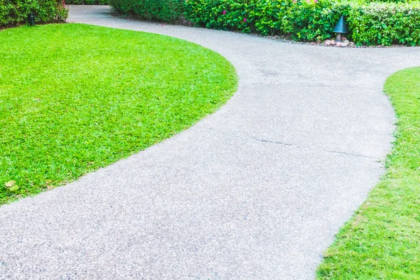 Stone path way around beautiful garden — Stock Photo, Image