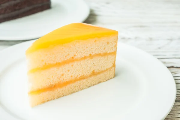 Délicieux gâteau au dessert orange — Photo