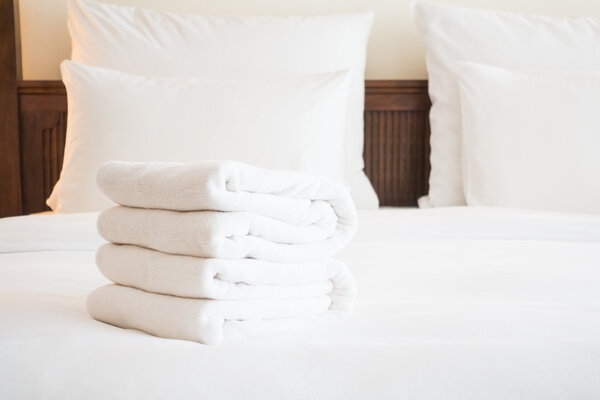 White towels on bed