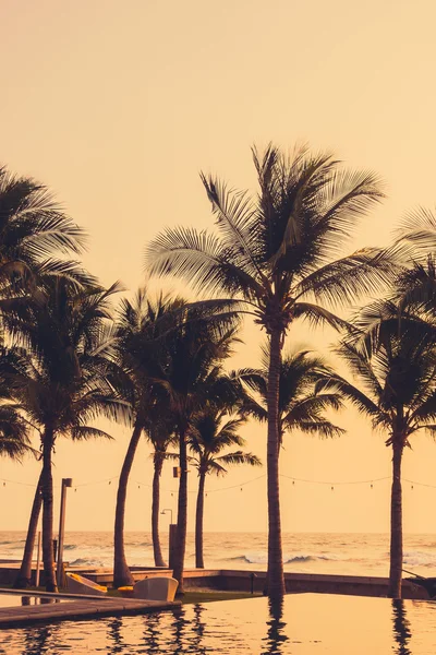 Silhouette palm tree with sunset — Stock Photo, Image