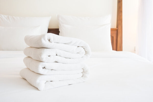 White towels on bed