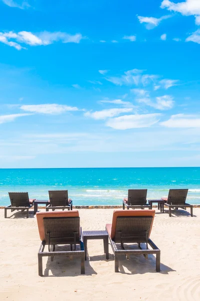 Umbrella and chair — Stock Photo, Image