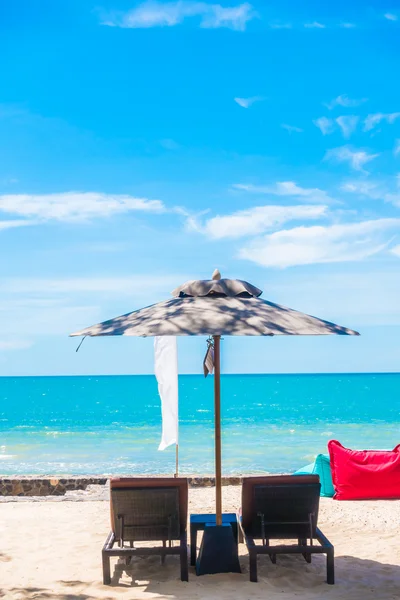 Umbrella and chair — Stock Photo, Image