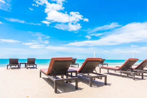 Umbrella and chair — Stock Photo, Image