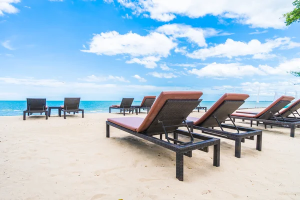 Umbrella and chair — Stock Photo, Image