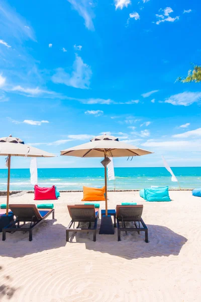 Umbrella and chair — Stock Photo, Image