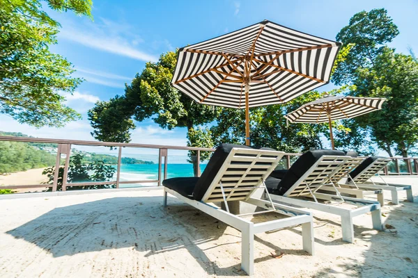 Beautiful luxury umbrella and chair — Stock Photo, Image