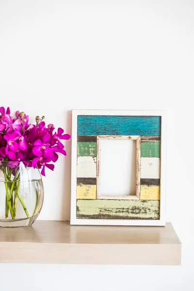 Photo frame with orchid flower — Stock Photo, Image