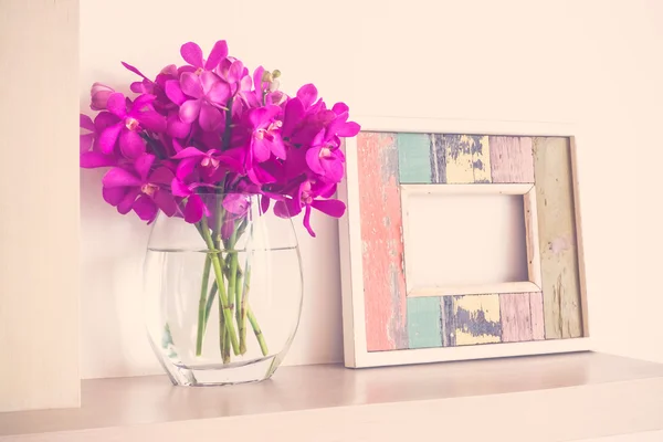 Photo frame with orchid flower — Stock Photo, Image