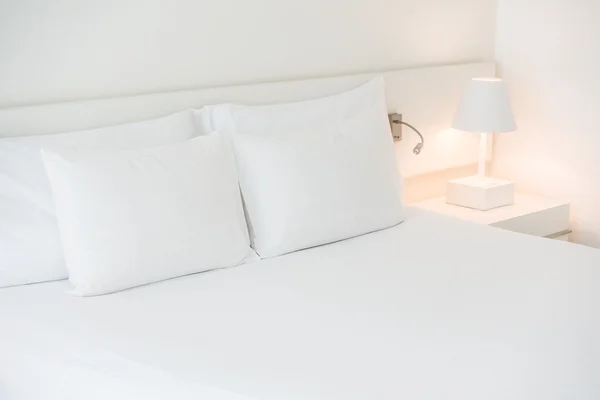 White pillow on bed — Stock Photo, Image