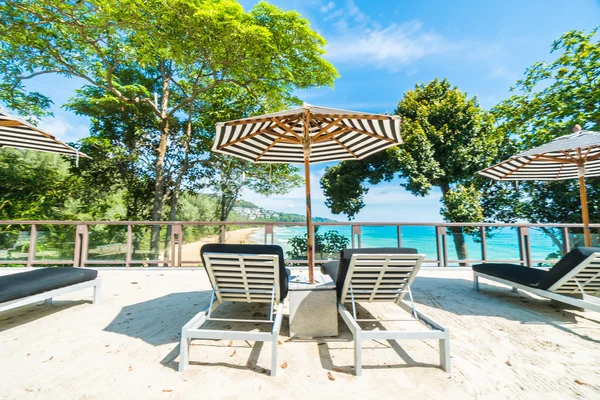 Umbrella and chair — Stock Photo, Image