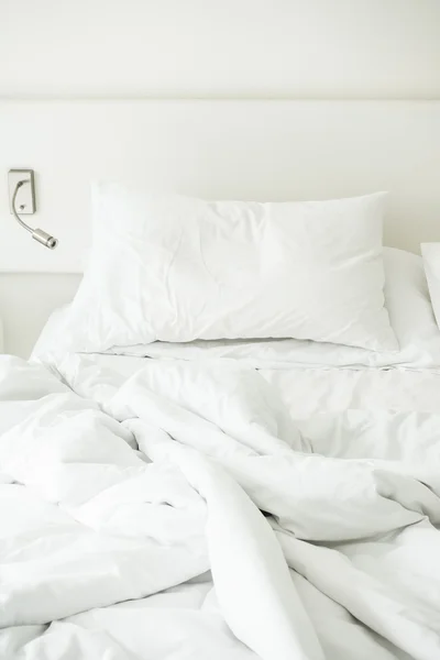 Rumpled bed in bedroom — Stock Photo, Image