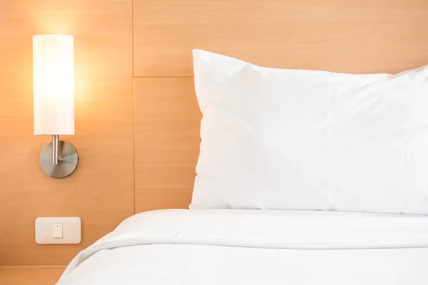 White pillow on bed — Stock Photo, Image