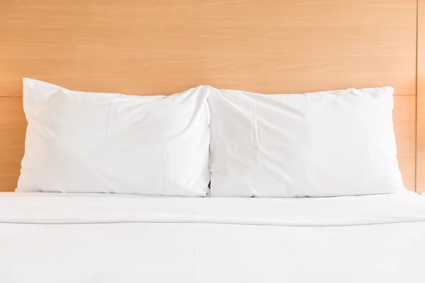 White pillow on bed — Stock Photo, Image