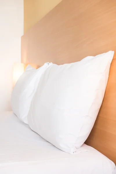 White pillow on bed — Stock Photo, Image
