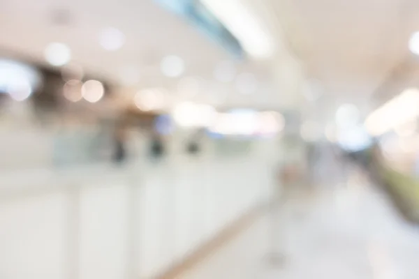 Centro comercial desenfoque abstracto para el fondo — Foto de Stock