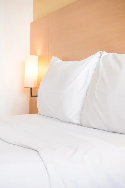 White pillow on bed — Stock Photo, Image