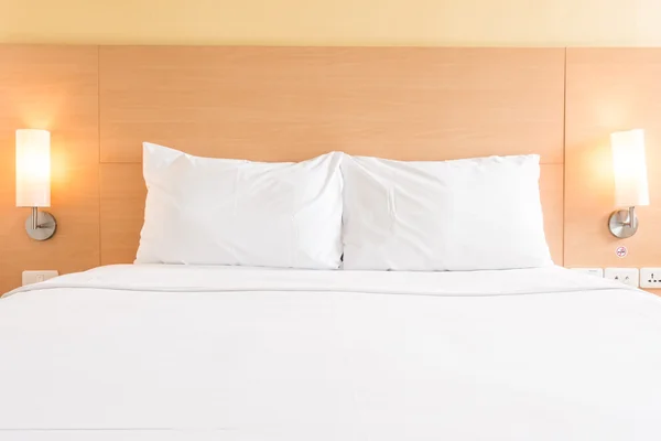 White pillow on bed — Stock Photo, Image