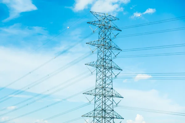 Electricity pole on blue sky — Stock Photo, Image