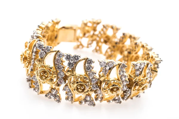 Gold bracelet and diamond jewelry — Stock Photo, Image