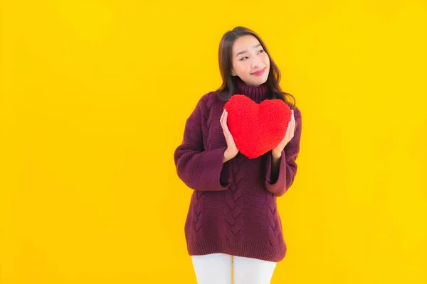 Portrait Beautiful Young Asian Woman Heart Pillow Shape Yellow Isolated — Stock Photo, Image
