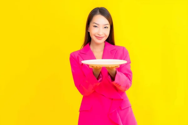 Portrait Beautiful Young Asian Woman Plate Dish Yellow Color Isolated — Stock Photo, Image