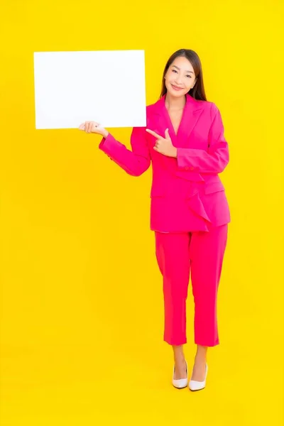 Portrait Beautiful Young Asian Woman Empty White Billboard Yellow Isolated — Stock Photo, Image
