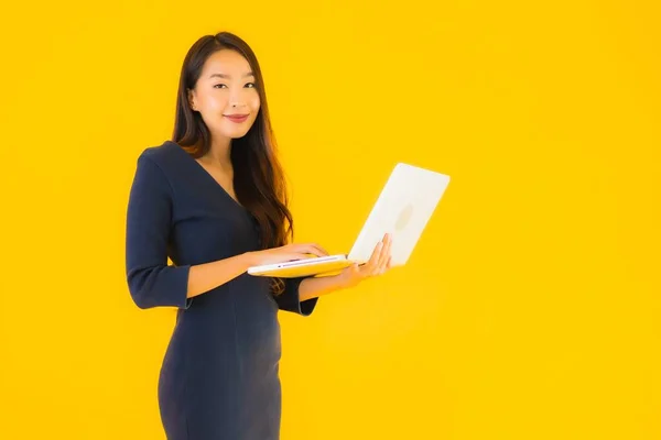 Portrait Beautiful Young Asian Woman Laptop Computer Yellow Isolated Background — Stock Photo, Image