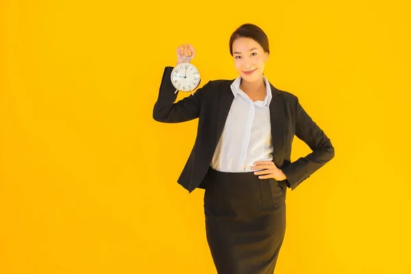 Portrait Beautiful Young Asian Woman Show Time Clock Alarm Yellow — Stock Photo, Image