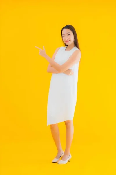 Portrait Beautiful Young Asian Woman Action Yellow Isolated Background — Stock Photo, Image