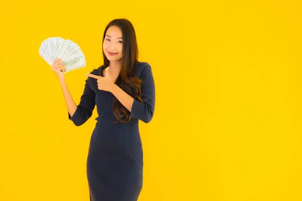 Portrait Beautiful Young Asian Woman Money Cash Yellow Isolated Background — Stock Photo, Image