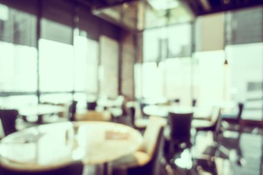 Arka plan için soyut bulanıklık ve odaklanmış kahve dükkanı ve restoran iç mekanı