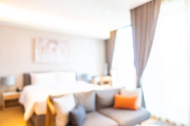 Arka plan için yatak odasındaki bulanıklık giderici yatak ve mobilyalar.