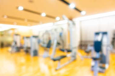 Beden eğitimi odasının içinde arka plan için soyut bulanık fitness ekipmanı