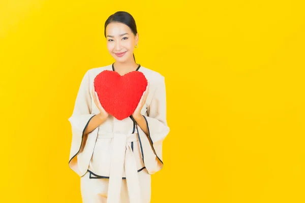 Portrait Beautiful Young Business Asian Woman Heart Pillow Shape Yellow — Stock Photo, Image