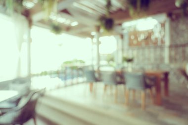 Arka plan için soyut bulanıklık ve kahve dükkanı ve restoran iç mekanı.