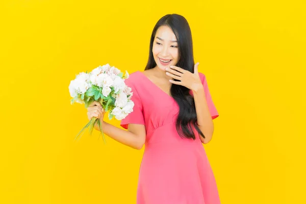 Portrait Beautiful Young Asian Woman Smile Flower Yellow Color Background — Stock Photo, Image