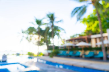 Seyahat ve tatil geçmişi için otel tatil beldesinde soyut bulanıklık ve açık yüzme havuzu
