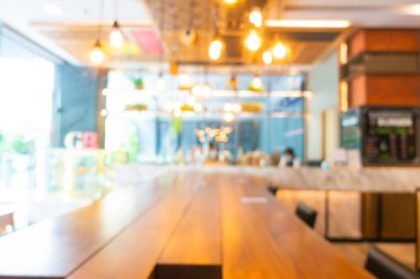 Arka plan için soyut bulanık restoran barı ve kafenin içi