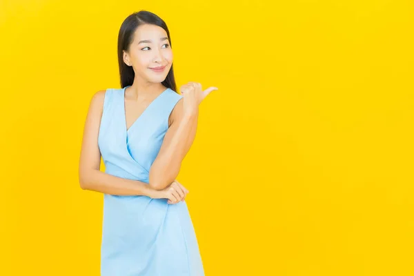Portrait Beautiful Young Asian Woman Smile Action Yellow Color Background — Stock Photo, Image